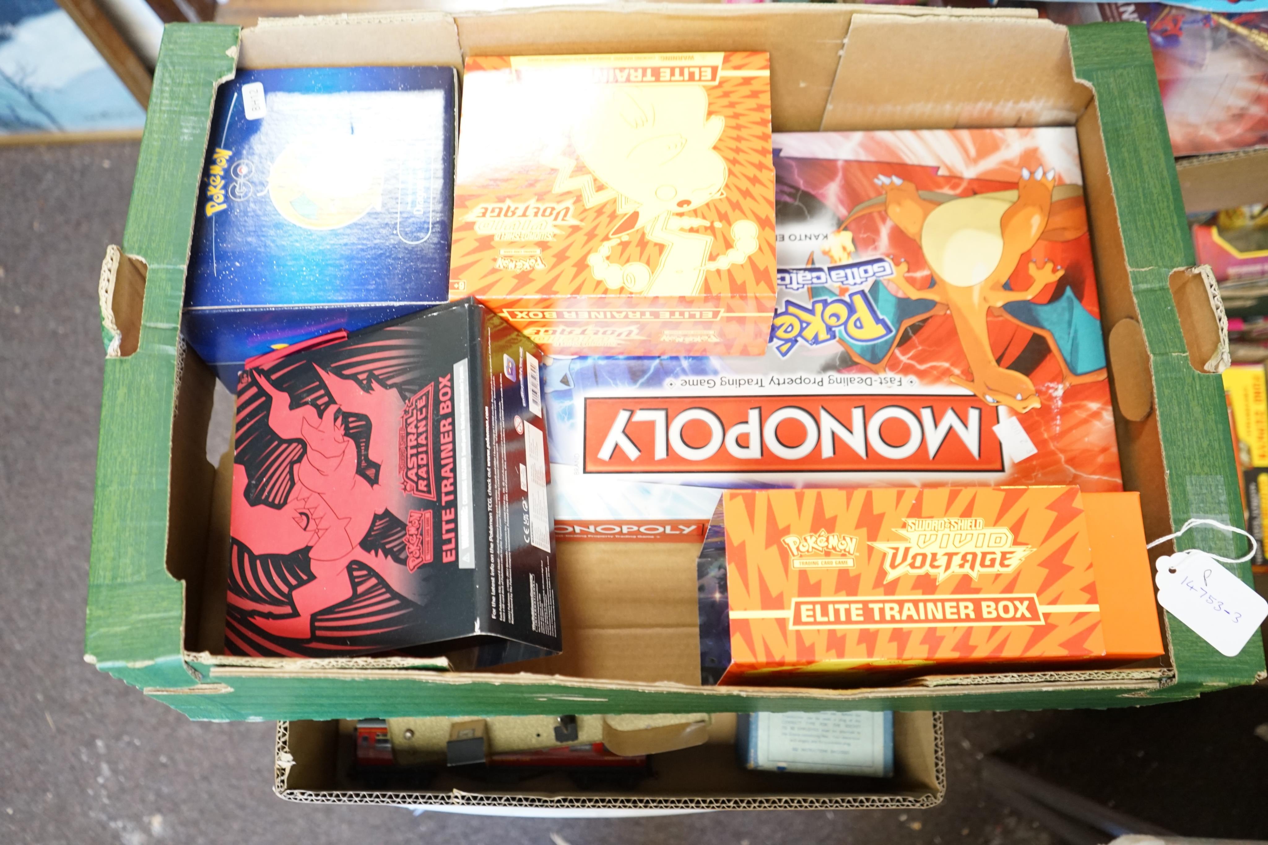 A collection of Pokemon cards and sets, including; approximately sixty 10-card expansion packs (opened), three Elite Trainer Boxes a Pokemon monopoly game, an Annihilape ex box, an Iron Valiant ex box, etc. (opened). Con